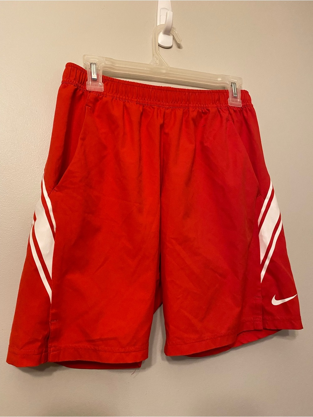 Nike Men’s Red Athletic Shorts with White Stripe Accents